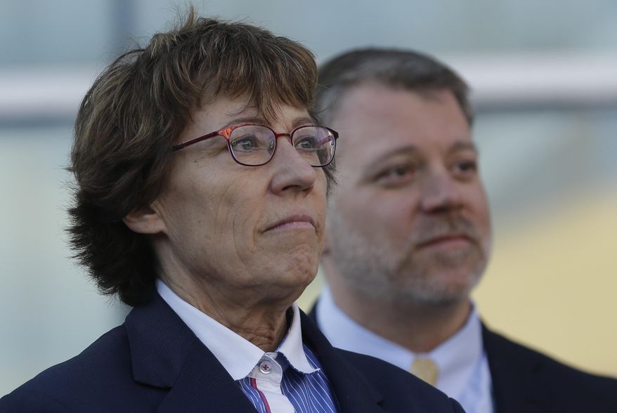 Attorneys Peggy Tomsic, left, and James E. Magleby look on during the Utah Unites for Marriage "send-off" event Monday, April 7, 2014, in Salt Lake City. On Wednesday, April 9, 2014, a three-judge panel in Denver will become the first federal appeals court to hear arguments regarding state same-sex marriage bans since the Supreme Court ruling in June that overturned part of a federal ban on gay marriage. A series of pro-gay marriage rulings in the previous nine months by federal judges has emboldened backers of gay marriage and spurred predictions that it’s only a matter of time before gay and lesbian couples will be able to legally marry across the United States. (AP Photo/Rick Bowmer)