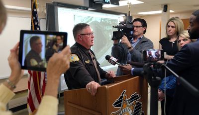 Kalamazoo County Sheriff Richard Fuller speaks during a news conference in Kalamazoo, Mich. on Wednesday, April 9, 2014. Fuller said an autopsy determined that a body found in an Indiana lake is that of Teleka Patrick, a Michigan doctor who had been missing since December. (AP Photo/Kalamazoo Gazette-MLive Media Group, Mark Bugnaski) ALL LOCAL TV OUT; LOCAL TV INTERNET OUT