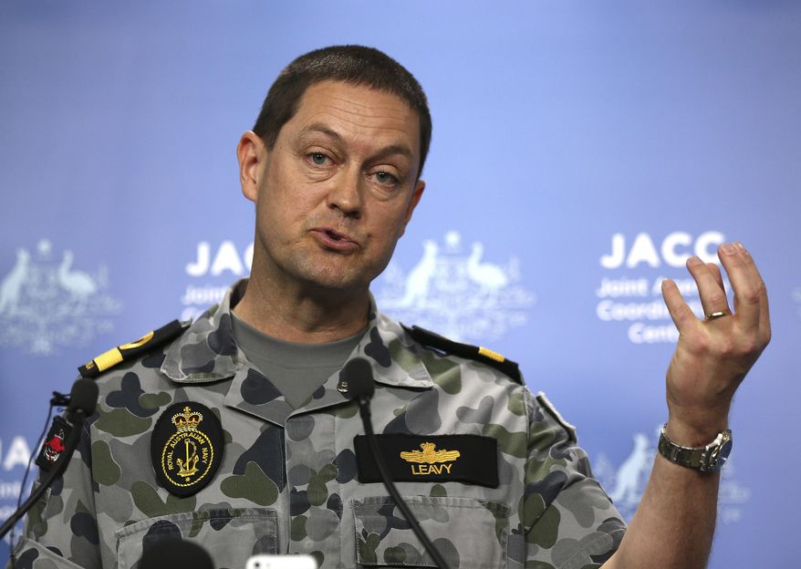 Royal Australian Navy commodore Peter Leavy speaks during a press conference about the ongoing search operations for missing Malaysia Airlines Flight 370 in Perth, Australia, Wednesday, April 9, 2014. A ship searching for the missing Malaysian jet has detected two more underwater signals that may be emanating from the aircraft's black boxes, and Angus Houston, the head of a joint agency coordinating the search for the missing plane in the southern Indian Ocean, expressed hope Wednesday that the plane's wreckage will soon be found. (AP Photo/Rob Griffith)