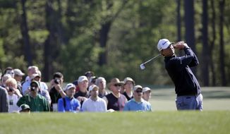 Lucas Glover tees off on the 12th hole during a practice round for the Masters golf tournament Wednesday, April 9, 2014, in Augusta, Ga. (AP Photo/David J. Phillip) 