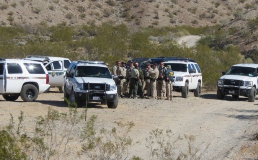 Rancher Clive Bundy snapped this picture of federal officials gathering near his Nevada property. (credit: Washington Free Beacon)