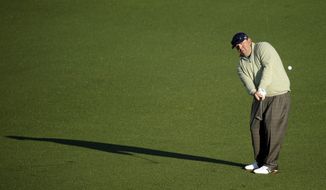 Kevin Stadler hits on the second fairway during the first round of the Masters golf tournament Thursday, April 10, 2014, in Augusta, Ga. (AP Photo/Chris Carlson) 