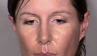 This image provided by the Las Vegas Metropolitan Police Department shows Alison Ernst, who was arrested April 10, 2014 in connection with an incident involving throwing a shoe at Former Secretary of State and Former First Lady Hillary Clinton.  Alison was arrested for Disorderly Conduct and released. (AP Photo/Las Vegas Metropolitan Police Department)