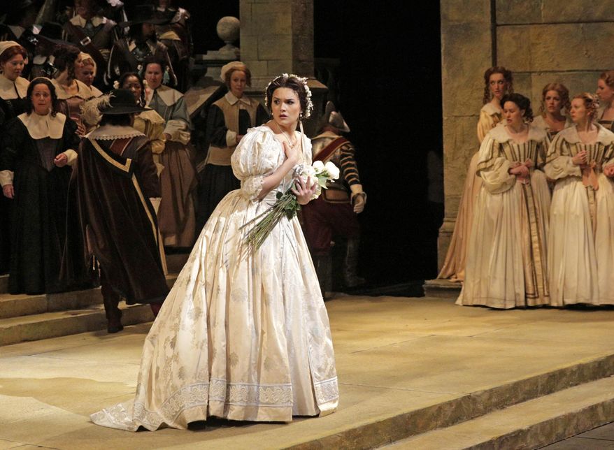 This image released by the Metropolitan Opera shows Olga Peretyatko during a dress rehearsal at the Metropolitan Opera in New York, for Vincenzo Bellini's "I Puritani." The production opens on April 17 for a run of seven performances, ending on the last night of the season, May 10. (AP Photo/Metropolitan Opera, Ken Howard)