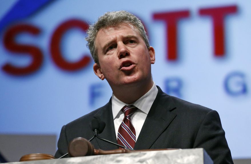 Colorado Secretary of State Scott Gessler speaks to Republican delegates at the state GOP Congress, hoping to become Republican candidate for governor, in Boulder, Colo., Saturday April 12, 2014. Seven Republicans competed for the right to challenge Democratic Gov. John Hickenlooper this fall, including two former congressmen and the secretary of state. (AP Photo/Brennan Linsley)