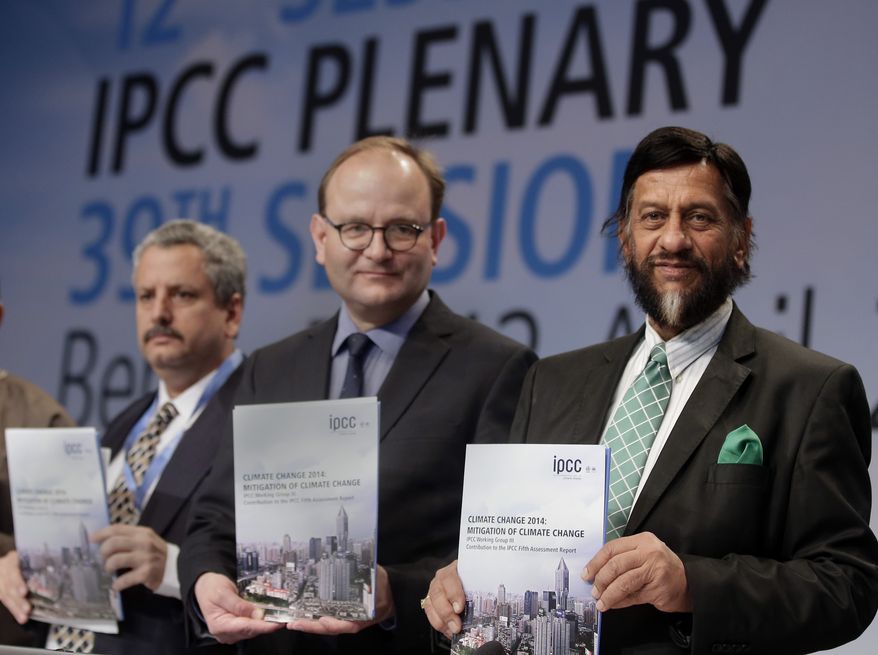 Ramon Pichs Madruga, Co-Chairman of the IPCC Working Group III, Ottmar Edenhofer, Co-Chairman of the IPCC Working Group III, and Rejendra K. Pachauri, Chairman of the IPCC, from left, pose prior to a press conference as part of a meeting of the Intergovernmental Panel on Climate Change (IPCC) in Berlin, Germany, Sunday, April 13, 2014. The panel met from April 7, 2014 until April 12, 2014 in the German capital.  (AP Photo/Michael Sohn)