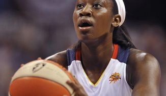 FILE - In a June 15, 2012, file photo Connecticut Sun&#39;s Tina Charles shoots a free throw in the first half of a WNBA basketball game against the New York Liberty in Uncasville, Conn.  People familiar with the situation say the Connecticut Sun have agreed to trade Tina Charles to New York for players to be named later and the Liberty&#39;s first round pick in 2015.  (AP Photo/Jessica Hill, file)
