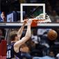 Charlotte Bobcats center Cody Zeller (40) scores against the Atlanta Hawks in the first half of an NBA basketball game against the Atlanta Hawks in Atlanta Monday, April 14, 2014.  (AP Photo/John Bazemore)