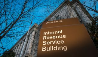 ** FILE ** This photo taken April 13, 2014, shows the headquarters of the Internal Revenue Service (IRS) in Washington at daybreak. (AP Photo/J. David Ake)