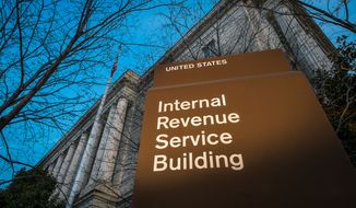 This April 13, 2014, file photo shows the headquarters of the Internal Revenue Service (IRS) in Washington. (AP Photo/J. David Ake, File)