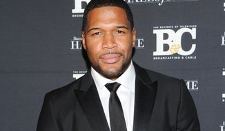 FILE - This Oct. 28, 2013 file photo shows former professional football player Michael Strahan, co-host of &amp;quot;Live with Kelly and Michael,&amp;quot; attending the 23rd Annual Broadcasting &amp;amp; Cable Hall of Fame Awards in New York. Strahan has made good on reports that he is joining &amp;quot;Good Morning America&amp;quot; by paying a visit to the ABC breakfast show on Tuesday, April 15, 2014. The former football star and current co-host with Kelly Ripa of &amp;quot;Live With Kelly and Michael&amp;quot; will join &amp;quot;Good Morning America&amp;quot; part-time. (Photo by Evan Agostini/Invision/AP, File)