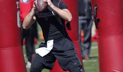 Georgia quarterback Aaron Murray works out for NFL football scouts during the school&#39;s pro day Wednesday, April 16, 2014 in Athens, Ga.   (AP Photo/John Bazemore)