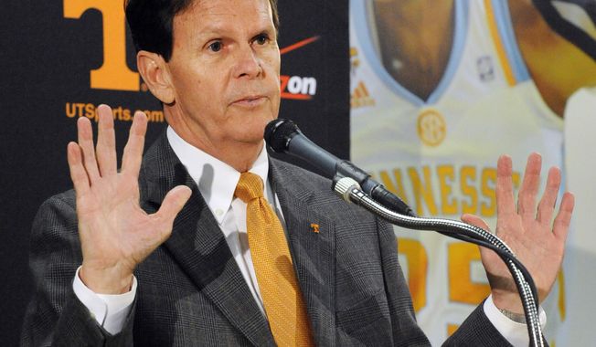 Tennessee athletic director Dave Hart announces Tennessee&#x27;s Cuonzo Martin is leaving to be head coach at California during a news conference Tuesday, April 15, 2014, in Knoxville, Tenn. Hart said Martin&#x27;s departure came as a surprise. (AP Photo/The Knoxville News Sentinel, Michael Patrick)
