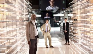 This image released by Warner Bros. Pictures shows Morgan Freeman, from left, Cillian Murphy, and Rebecca Hall in a scene from &amp;quot;Transcendence.&amp;quot; (AP Photo/Warner Bros. Pictures, Peter Mountain)