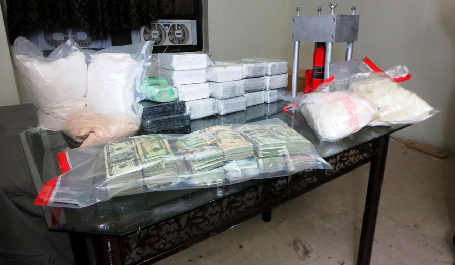 William J. Bennett, the nation&#x27;s first drug czar, is critical of the Obama administration -- especially the president -- for not using the &quot;bully pulpit&quot; of the White House to speak out against illegal drug use. A drug bust in New York City (pictured) netted more than $12 million in heroin and $500,000 in crystal methamphetamine. (AP Photo/Office of the Special Narcotics Prosecutor for the City of New York)