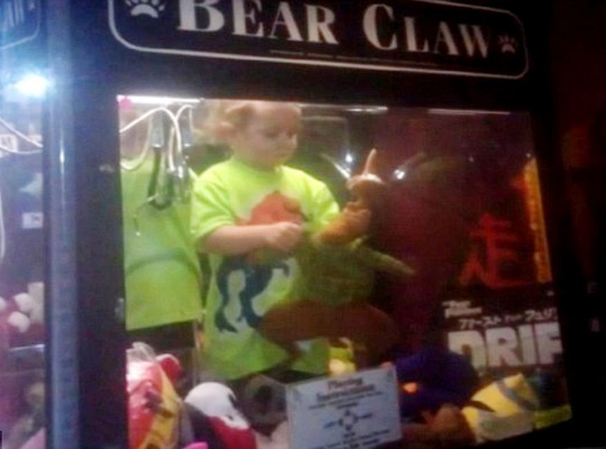 Nebraska toddler Kael Ireland was found playing with toys inside the Bear Claw arcade game. Photo: WOWT/Nebraska