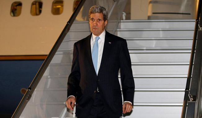 Secretary of State John Kerry arrives in Geneva, Wednesday, April 16, 2014, where he is scheduled to participate in talks on the ongoing situation in Ukraine with representatives from Ukraine, Russia and the European Union. (AP Photo/Jim Bourg, Pool)