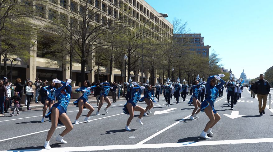Members of Eastern High School Ramblers dance team was one of several area schools to perform in the annual Emancipation Day Parade on Wednesday, April 16. Khalid Naji-Allah /Special to The Washington Times
