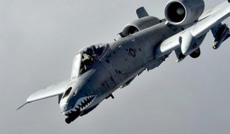 A U.S. Air Force A-10 Thunderbolt II from the 74th Expeditionary Fighter Squadron, Bagram Airfield, Afghanistan flies a combat sortie Jan. 7, 2014, over Northeast, Afghanistan. (U.S. Air Force photo by Tech. Sgt. Jason Robertson/not reviewed) 