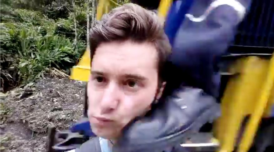 Teen taking a train selfie kicked in the head by conductor.