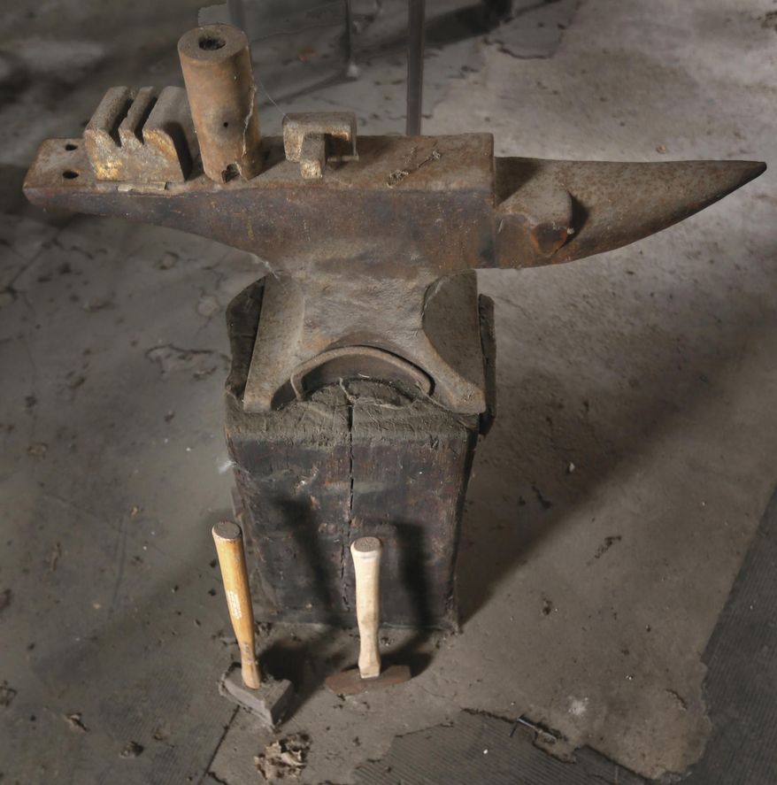 ADVANCED FOR RELEASE SATURDAY, APRIL 19, 2014 This April 10m, 2014 photo shows the anvil at the blacksmith shop at the Milton House Museum. (AP Photo/The Janesville Gazette, Bill Olmsted)