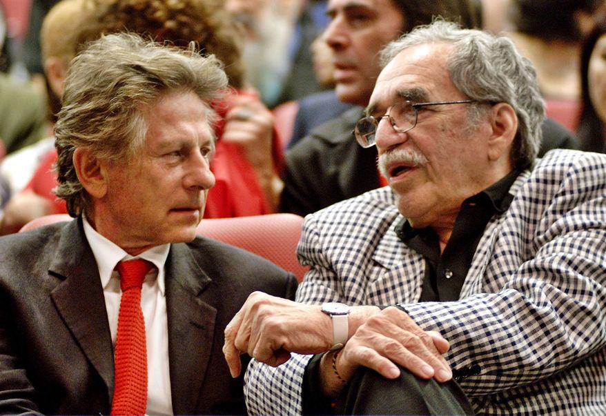 FILE - In this Dec.13, 2002 file photo, film director Roman Polanski, left, and Colombian Nobel laureate Gabriel Garcia Marquez speak during the closing ceremony of the Cuban International Film Festival in Havana, Cuba. Marquez died Thursday April 17, 2014 at his home in Mexico City. (AP Photo)