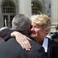 Plaintiff challenging Oklahoma&#39;s gay marriage ban Sue Barton, left, gets a hug from her pastor, Tulsa based Reverend Leslie Penrose, of the United Church of Christ, after leaving court following a hearing at the 10th U.S. Circuit Court of Appeals in Denver, Thursday, April 17, 2014. The appeal of a lower court&#39;s January ruling that struck down Oklahoma&#39;s gay marriage ban is the second time the issue has reached appellate courts since the U.S. Supreme Court shook up the legal landscape last year by finding the federal Defense of Marriage Act was unconstitutional. (AP Photo/Brennan Linsley)