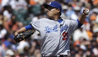 Los Angeles Dodgers pitcher Hyun-Jin Ryu (99), from South Korea, throws against the San Francisco Giants during the second inning of a baseball game in San Francisco, Thursday, April 17, 2014. (AP Photo/Jeff Chiu)