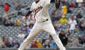 Minnesota Twins starting pitcher Kyle Gibson delivers to the Toronto Blue Jays during the first inning of the first baseball game of a doubleheader in Minneapolis, Thursday, April 17, 2014.  (AP Photo/Ann Heisenfelt)