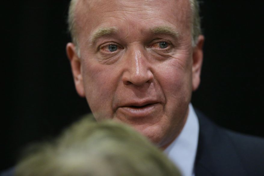 Steve Gray, an investor in the Cedar Rapids casino, becomes emotional as he speaks to commissioner Dolores Hertz, after the Iowa Racing and Gaming Commission voted to reject the proposed $164 million Cedar Rapids casino, during a hearing in Council Bluffs, Iowa, Thursday, April 17, 2014. The Iowa Racing and Gaming Commission said a new casino would hurt existing ones. (AP Photo/Nati Harnik)
