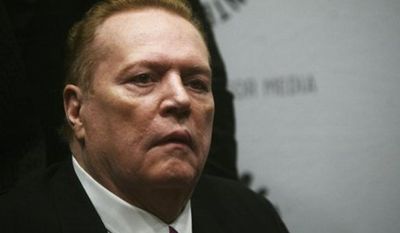 FILE - In this Oct. 26, 2007 file photo, Hustler magazine founder Larry Flynt arrives at the premiere of the documentary &#39;Larry Flynt: The Right to be Left Alone&#39; at The Paley Center for Media in New York. An AIDS activist group filed a workplace safety complaint against Larry Flynt on Thursday, Aug. 26, 2010, accusing the porn king of creating an unsafe environment for his stable of sex stars by not requiring they use condoms. (AP Photo/Gary He, File)