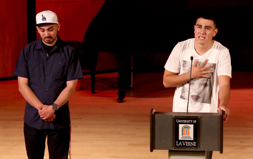 In This Photo Provided By The University Of La Verne, David Arzola, along with his older brother James, expresses heartbreak, in front of family, friends and the colleagues of Arthur "Tury" Arzola, Jr. who was memorialized at a service on Wednesday April 16, 2014. The University of La Verne graduate student was one of the 10 people killed in the tragic crash when a FedEx truck collided into a busload of students, chaperones and advisors who were heading to Humboldt State University. Arzola was a recruiter for Humboldt State University, and part of the close-knit University of La Verne community. (AP Photo/University Of La Verne, Nancy Newman)