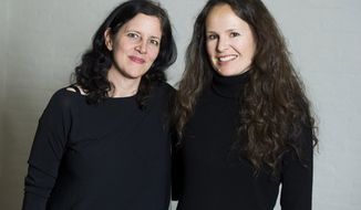 This April 16, 2014 photo shows Laura Poitras, left, and Johanna Hamilton in New York to promote their documentary film &amp;quot;1971,&amp;quot; premiering Friday at the Tribeca Film Festival. (Photo by Charles Sykes/Invision/AP)