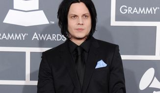 FILE - This Feb. 10, 2013 file photo shows musician Jack White at the 55th annual Grammy Awards in Los Angeles. White is going direct to vinyl with the first live performance of a song off his upcoming album on Record Store Day. Fans will get to see him perform the title track from &amp;quot;Lazaretto&amp;quot; on Saturday morning, which will be recorded and pressed into a limited edition vinyl record that afternoon. (Photo by Jordan Strauss/Invision/AP, File)