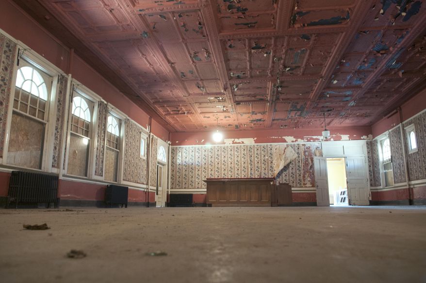 This Tuesday April 8, 2014 photo shows the dining room in the century-old La Castaneda Hotel in Las Vegas, N.M. on Tuesday, April 8, 2014. Allan Affeldt purchased the property in April 2014 and plans to restore the hotel which was originally built in 1898 to serve as food-and-rest stop along the Santa Fe Railway. (AP Photo/Albuquerque Journal, Eddie Moore)