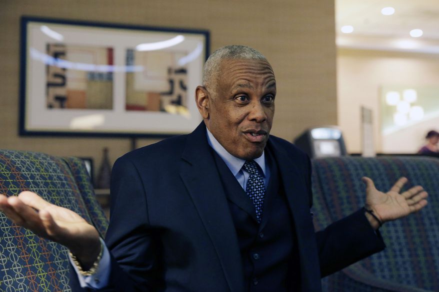 In this April 15, 2014 photo, Logan Township Mayor Frank Minor answers a question in Logan Township, N.J. Minor is a Congressional candidate for New Jersey’s 1st District seat held since 1990 by Rob Andrews, who announced on Feb. 4, that he was resigning to take a job with a law firm. In the June 3, Democratic primary, Minor will face state Sen. Donald Norcross and Frank Broomell Jr., a 27-year-old former Marine who is now working on his master’s degree at Harvard. (AP Photo/Mel Evans)