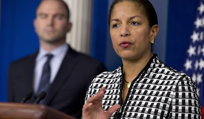 National Security Adviser Susan Rice, right, accompanied by Ben Rhodes, deputy National Security Adviser for Strategic Communications and Speechwriting, speaks about President Barack Obama&#x27;s upcoming trip to Asia, Friday April 18, 2014 , at the White House briefing room in Washington.  (AP Photo/Jacquelyn Martin)
