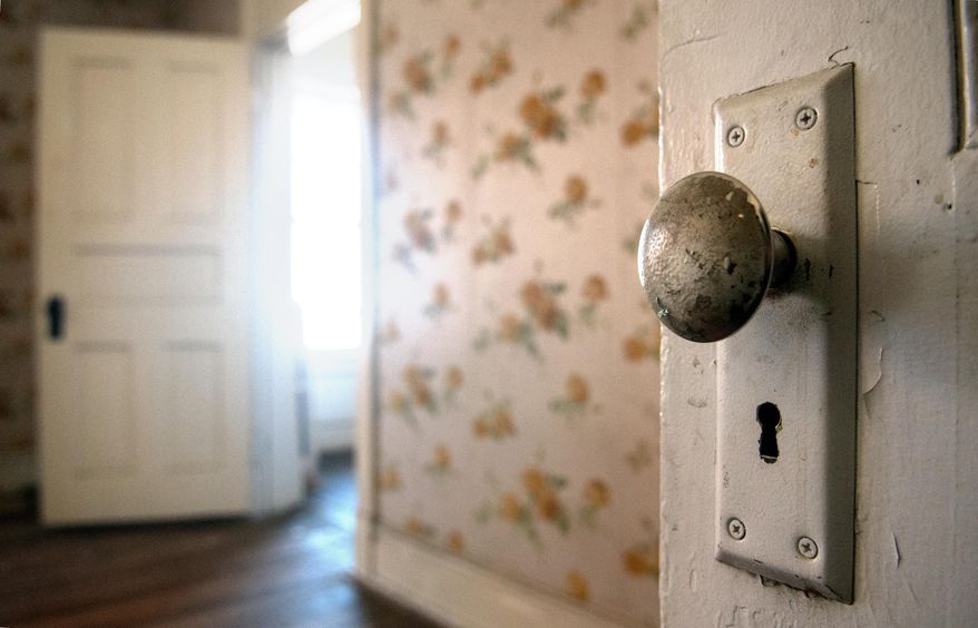 This Tuesday April 8, 2014 photo shows a doorknob in the century-old La Castaneda Hotel in Las Vegas, N.M. on Tuesday, April 8, 2014. Allan Affeldt purchased the property in April 2014 and plans to restore the hotel which was originally built in 1898 to serve as food-and-rest stop along the Santa Fe Railway. (AP Photo/Albuquerque Journal, Eddie Moore)