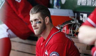 dWashington Nationals&#39; Bryce Harper sits on the bench during the fourth inning of a baseball game against the St. Louis Cardinals at Nationals Park on Saturday, April 19, 2014, in Washington. The Cardinals won 4-3. Harper was pulled early from a game after Washington manager Matt Williams said the young outfielder didn&#39;t hustle. Harper was taken out after six innings. The 21-year-old Harper is a two-time All-Star known for his aggressive play. But in the sixth inning, he hit the ball to the mound, jogged to first and took a right turn to the dugout before getting halfway down the basepath. (AP Photo/Alex Brandon)