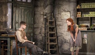This image released by Boneau/Bryan-Brown shows Daniel Radcliffe, left, and Sarah Green performing in &amp;quot;The Cripple of Inishmaan,&amp;quot; opening April 20 at the Cort Theatre in New York. (AP Photo/Boneau/Bryan-Brown, Johan Persson)