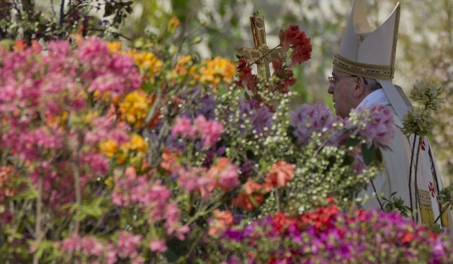 Flowers from the Netherlands decorate St. Peter&#x27;s Square as Pope Francis arrives to celebrate an Easter Mass in St. Peter&#x27;s Square at the the Vatican, Sunday, April 20, 2014. Francis is celebrating Christianity&#x27;s most joyous day, Easter Sunday, under sunny skies in St. Peter&#x27;s. (AP Photo/Andrew Medichini)