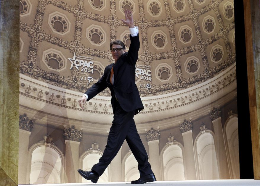 ** FILE ** In this March 7, 2014, file photo Texas Gov. Rick Perry waves as he walks off of the stage after speaking at the Conservative Political Action Committee annual conference in National Harbor, Md. Perry has spent a record 14 years in office, but with eight months left he is now the focus of a grand jury investigation over a veto last summer. (AP Photo/Susan Walsh, File)