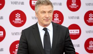 FILE - In this April 10, 2014 file photo, Alec Baldwin arrives 2014 TCM Classic Film Festival&#x27;s Opening Night Gala at the TCL Chinese Theatre in Los Angeles. Officials at the Adams Memorial Library in Central Falls, R.I., said Baldwin will headline a fundraiser for the struggling public library June 7, at Fete in Providence, R.I. (Photo by Annie I. Bang /Invision/AP, File)