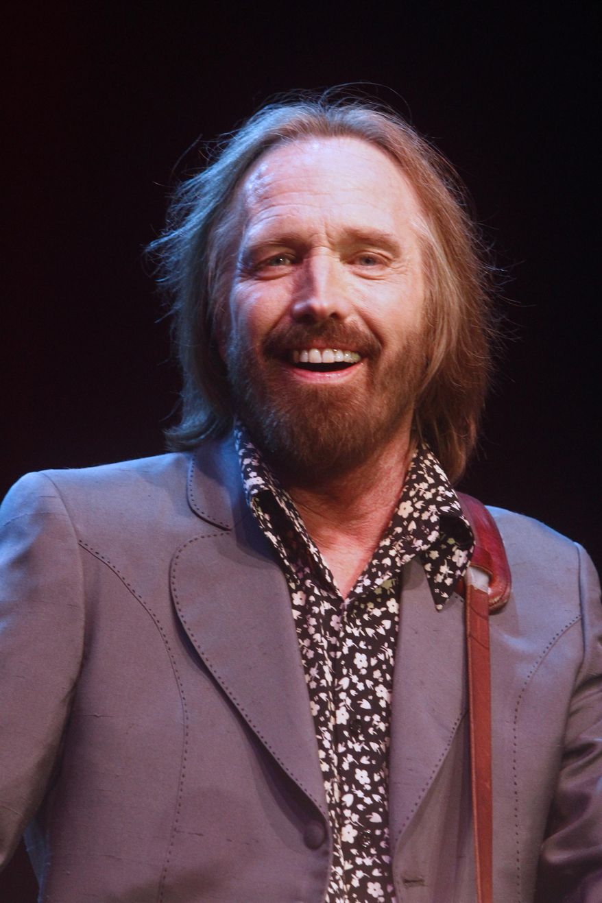 FILE - In this June 16, 2013 file photo, Tom Petty performs on Day 4 of the 2013 Bonnaroo Music and Arts Festival in Manchester, Tenn. Songwriting has gotten harder, not easier, with time, says Petty, who will receive top honors from the American Society of Composers, Authors and Publishers on Wednesday, April 23, 2014, for his four decades in music. (Photo by Wade Payne/Invision/AP, file)