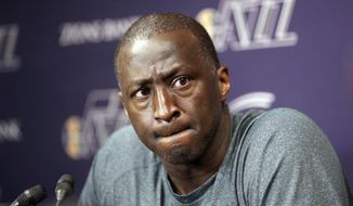 FILE - In this April 17, 2014, file photo, Utah Jazz coach Tyrone Corbin speaks to reporters on the day the Jazz cleaned out their lockers after a 25-57 season in Salt Lake City. The Jazz announced Monday, April 21, 2014, that the team won&#x27;t be offering Corbin a new contract. (AP Photo/Rick Bowmer, File)