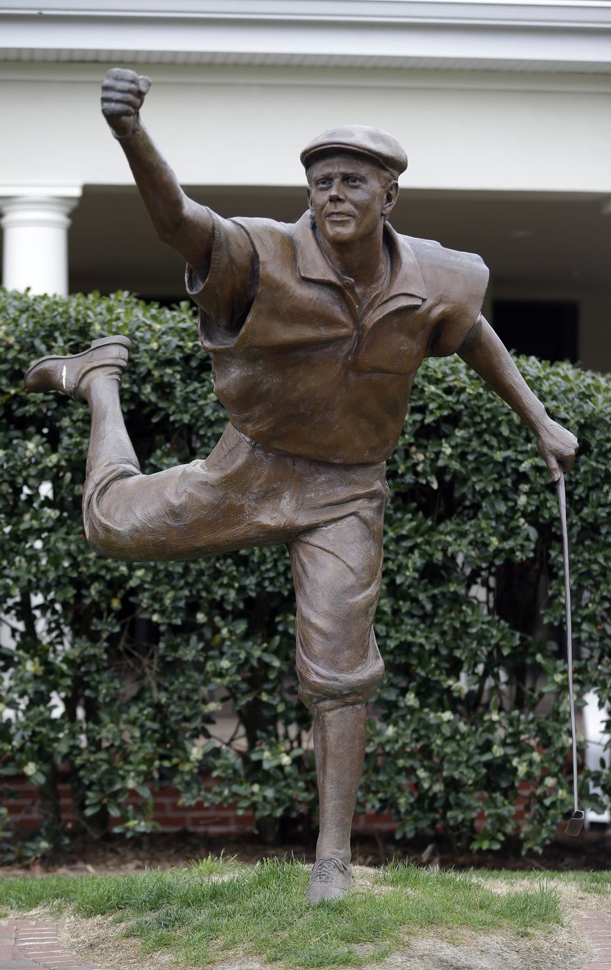 A statue of golfer Payne Stewart overlooks the 18th green at Pinehurst Resort & Country Club’s Course No. 2 in Pinehurst, N.C., Monday, April 14, 2014. The No. 2 course will host the 2014 U.S. Open Championship June 12-15 and the 2014 U.S. Women’s Open Championship June 19-22. (AP Photo/Gerry Broome)