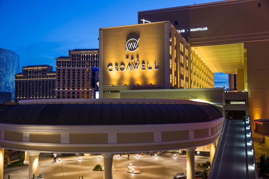 This April, 2014 photo provided by The Cromwell shows the exterior of The Cromwell Hotel and Casino. Slot machines are now ringing at the boutique hotel replacing Bill's Gamblin' Hall & Saloon in the heart of the Las Vegas Strip. The Cromwell celebrated its soft opening Monday evening, April 21, 2014 by welcoming guests into a 40,000-square-foot casino featuring 434 slot machines and 66 table games. The hotel's 188 rooms and suites are not accepting guests until May 21, but the gambling area, the Interlude cocktail lounge and the Curios retail shop are open for business. (AP Photo/The Cromwell, Erik Kabik)