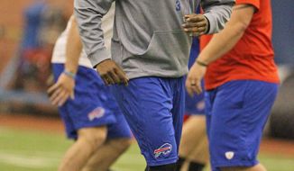 Buffalo Bills quarterback EJ Manuel works on his footwork during voluntary drills at the teams NFL football training center in Orchard Park, N.Y., Tuesday, April 22, 2014. (AP Photo/The Buffalo News, James P. McCoy) TV OUT; MAGS OUT; SALAMANCA PRESS OUT; TONAWANDA NEWS OUT