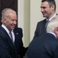 U.S. Vice President Joe Biden speaks with Ukrainian members of parliament, including Vitali Klitschko, facing camera right, during a meeting in Kiev, Ukraine, Tuesday, April. 22, 2014.  Vice President Joe Biden told Ukrainian political leaders Tuesday that the United States stands with them against &amp;quot;humiliating threats&amp;quot; and encouraged them to root out corruption as they rebuild their government. In the most high-level visit of a U.S. official since crisis erupted in Ukraine, Biden told leaders from various political parties that he brings a message of support from President Barack Obama as they face a historic opportunity to usher in reforms. (AP Photo/Sergei Chuzavkov)