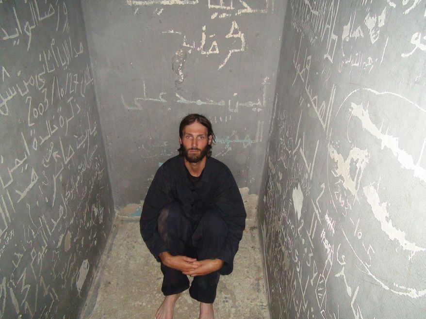 This image released by the Tribeca Film Festival shows Matthew VanDyke in a prison cell from the Marshall Curry film "Point and Shoot." The film won best documentary Thursday, April 24, 2014 at the Tribeca Film Festival in New York. (AP Photo/Tribeca Film Festival)